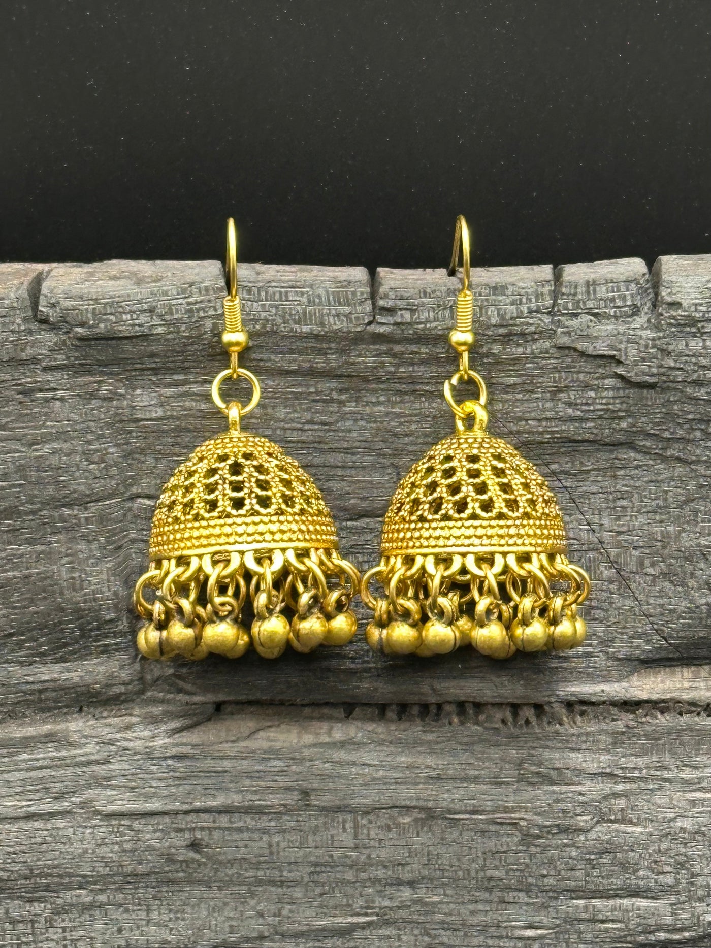 Golden jhumka earrings